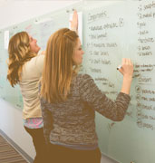 displays2go employees at white board