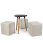 Low Triangular MDF Coffee Table Seating Set Creates a Striking Look in Public Spaces Black low triangular MDF coffee table seating set with upholstered cubes