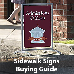 A sidewalk sign shown outside the entrance to a college admissions office