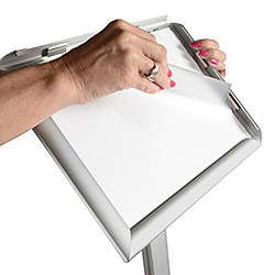 Snap open sign stands feature front-opening designs for quick and easy changes when needed Close-up of a front-opening snap frame sign stand