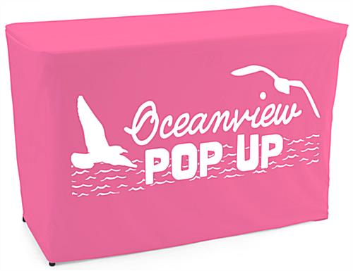 This Pink Convertible Table Cover with Custom Printing Will Help Your Booth Stand Out at Trade Shows Pink convertible table cover with custom printing and durable polyester material