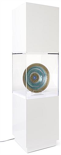 This Illuminated Pedestal Display Case Helps Showcase Delicate Pieces White illuminated pedestal display case