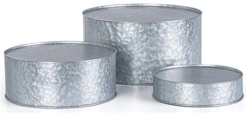 These Round Galvanized Risers Will Add a Vintage Touch to Any Space Round galvanized risers with hand-applied distressing technique