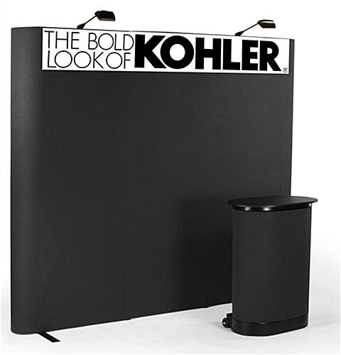 This pop up trade show display includes a custom header pop up trade show display