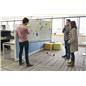 Whiteboard with wheels for stand-up meeting