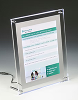 Backlit picture frame with slant back design 