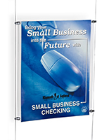 Sign holder with cable system 