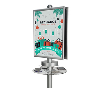 Device charging station with custom printed sign.