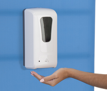 Automatic hand sanitizer dispenser mounted on wall.