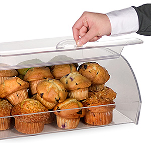 clear countertop bin filled with muffins