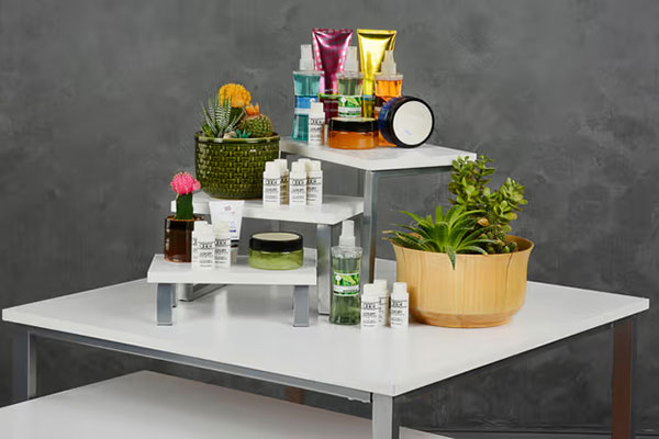 Countertop risers displaying products on a retail table
