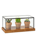 Rustic glass countertop showcase with black metal piping around edges