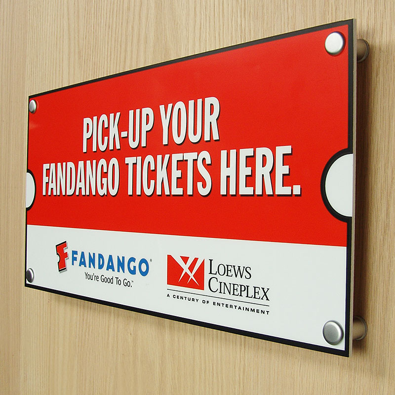 Wall mounted sign with tamperproof standoffs