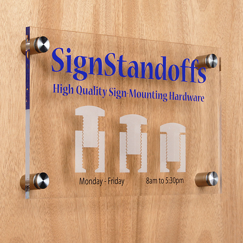 Wall mounted sign panel with stainless steel standoffs