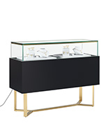 Retail glass display counter with gold accents