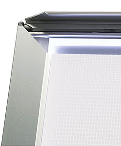 Closeup of a poster light box with internal illuminated grid pattern