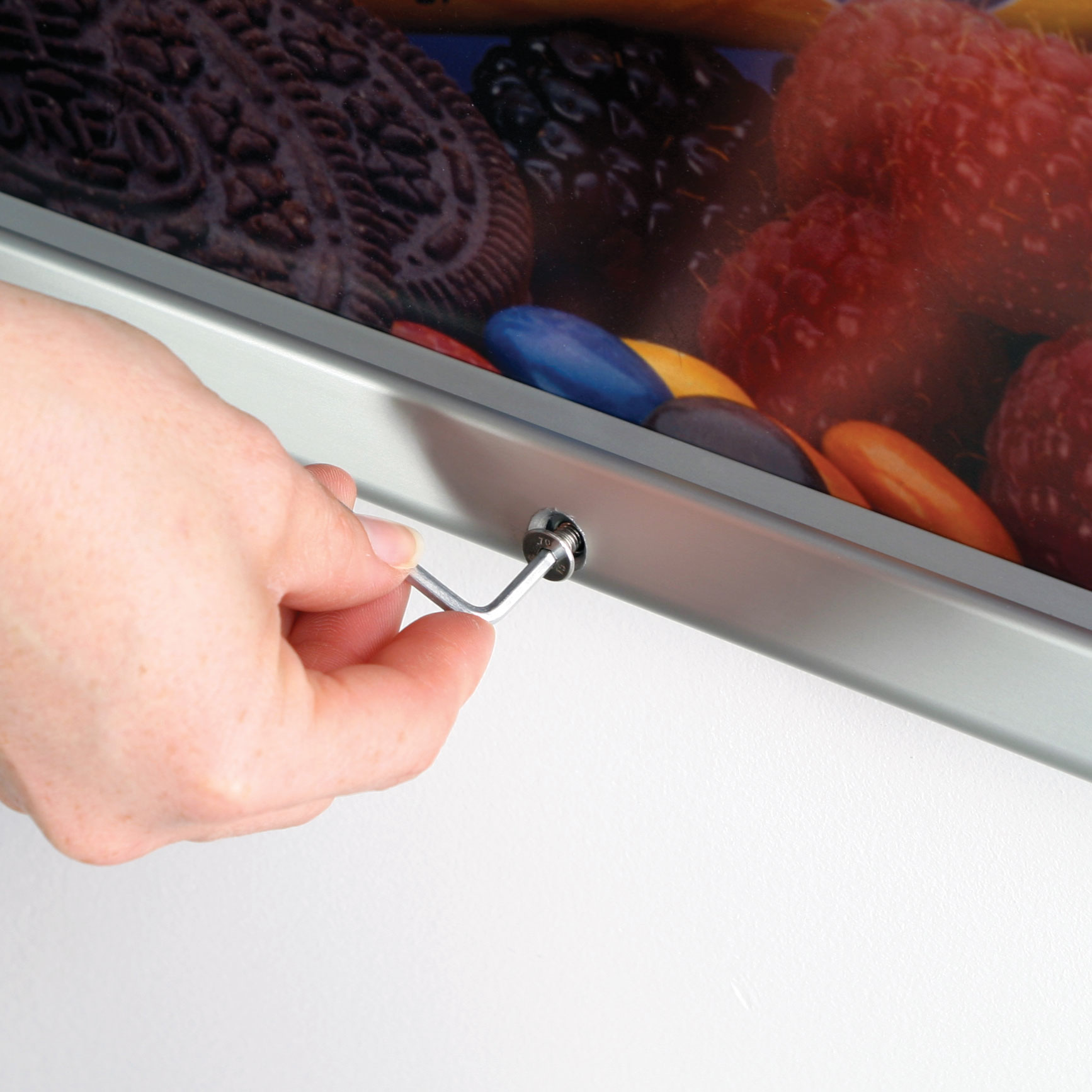 Locking Picture Frame Example Locking Wall Frames with Snap Edges Keep Graphics Secure | Displays2Go