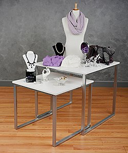 Retail nesting tables displaying products for sale