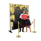Red rope stanchion event backdrop with brass finished poles 