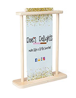 Small tabletop banner stand with wood frame and custom graphic insert
