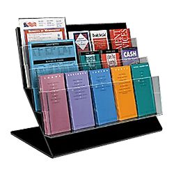 A countertop magazine holder made with smoky acrylic plastic