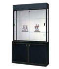 This wooden display case features a sizable storage cabinet.