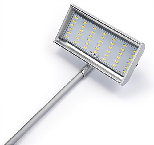 LED display arm lights with low profile tilting top
