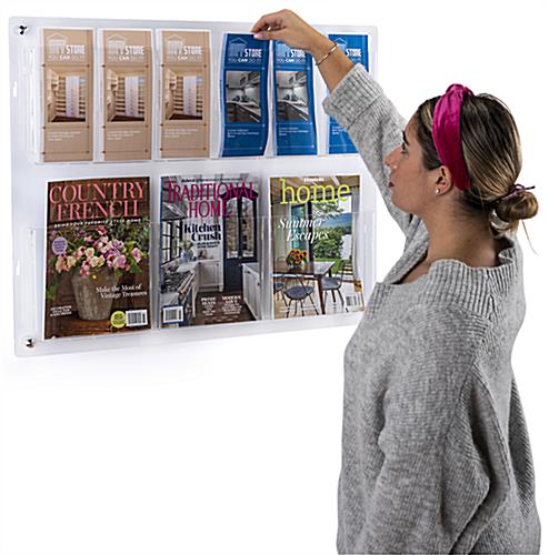 Wall mounted magazine rack with mounting hardware included 