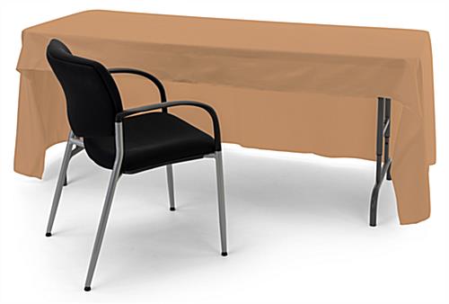Tan open back tablecloth with room for a presenter