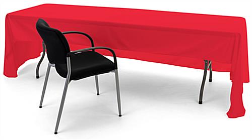 Red 3-sided event table cloth with easy access to storage and seating from behind