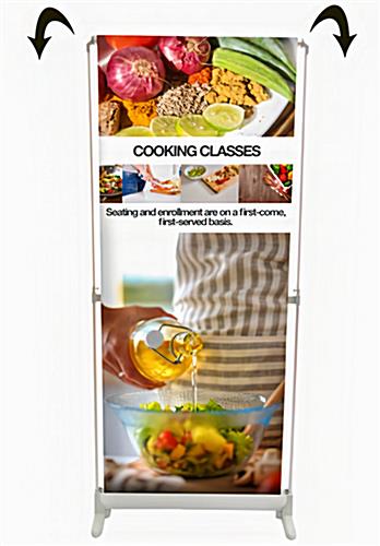 Scrolling banner display with printed graphics