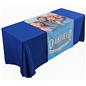 Blue throw on a table with a custom printed table runner
