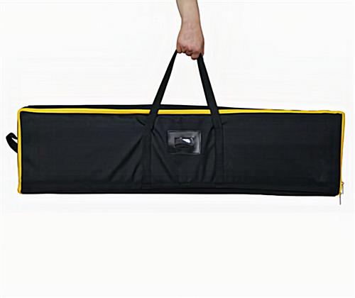 Glow Retractable Banner Stand tote being held by the handles
