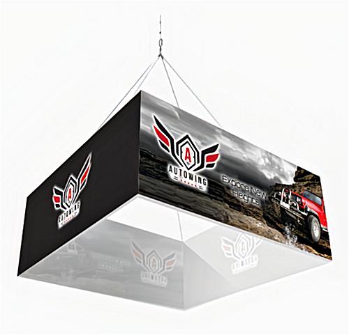 Square hanging trade show event banner with custom graphics seen from a low angle and showing the hanging hardware