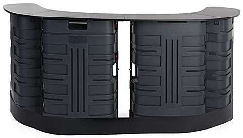 Shipping case counter kit with black kickplate to conceal wheels