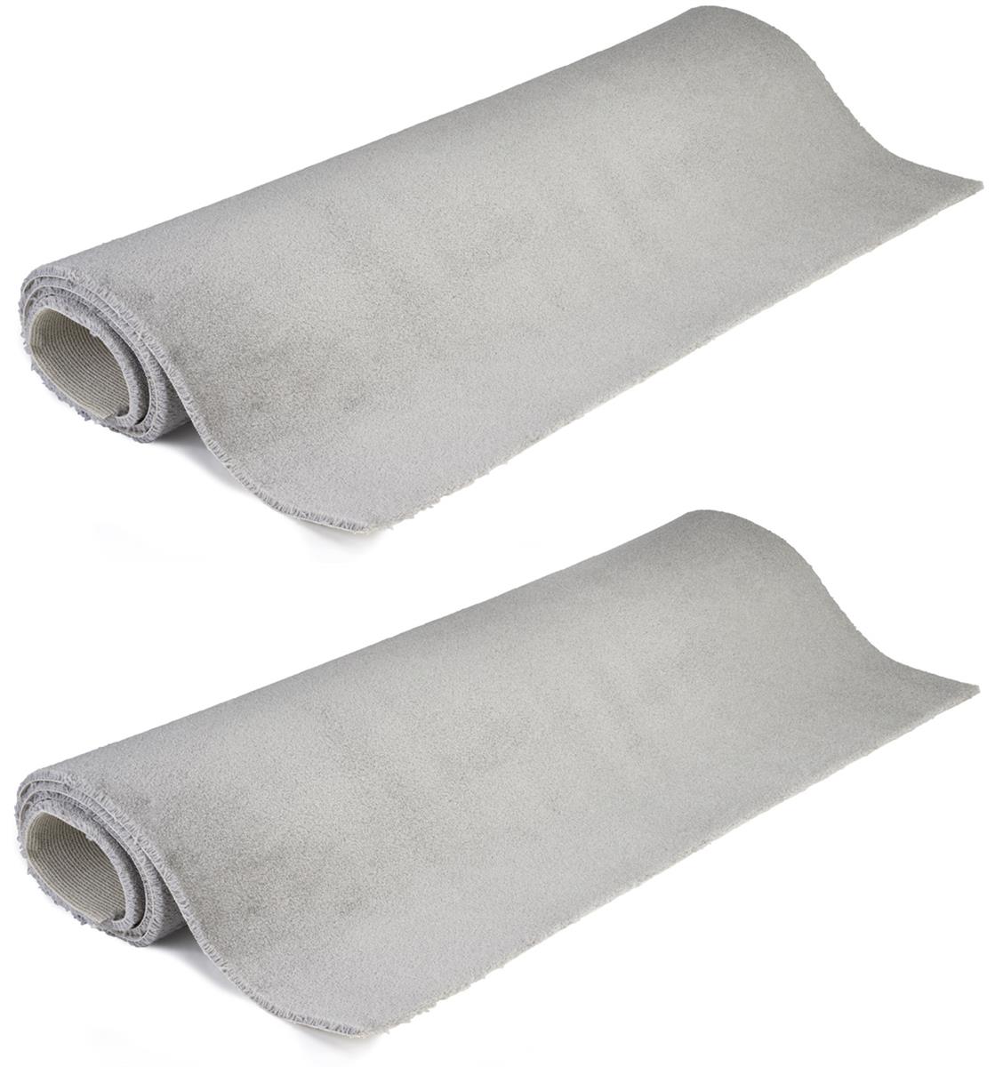 Two rolled gray carpet strips