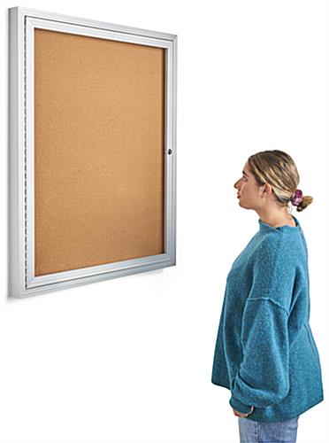 This enclosed aluminum bulletin board is a wall mount frame