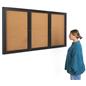 This 72 x 36 locking bulletin board features mitered corners