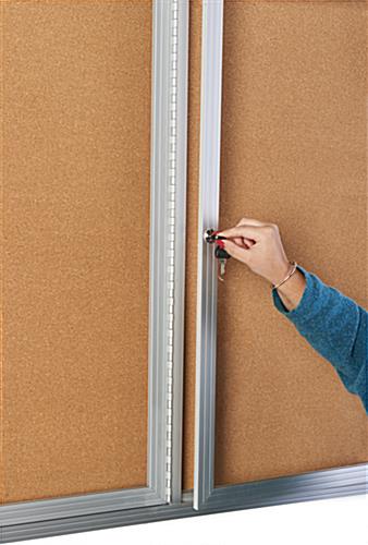 This 72 x 36 locking bulletin board has a key set for the doors