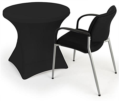 Black stretch polyester tablecloths are compatible with 29 inch tall round tables