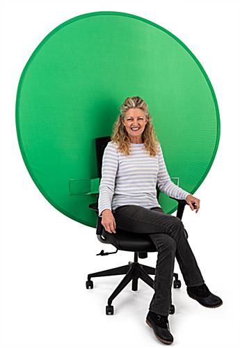 Person Sitting in Chair with Green Screen