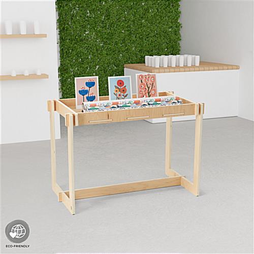 Wooden retail dump table with minimalistic design 