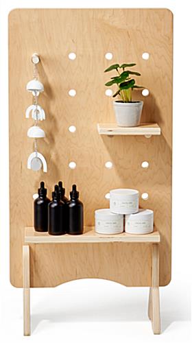 Modern wooden pegboard with shelves and collapsible design 