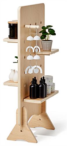 Wooden pegboard with shelves and double-sided display panel 