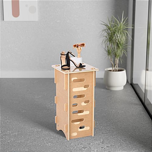 Collapsible pedestal with natural wood finish