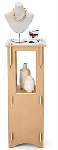 Wooden display pedestal with interlocking pieces for a hardware-free design