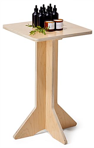 Collapsible wooden retail pedestal with minimal and modern design