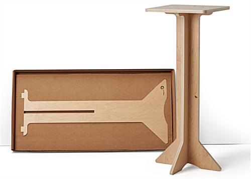 Flat pack retail table with recyclable carrying case 