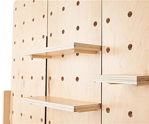 Wooden pegboard accessories with natural wood finish
