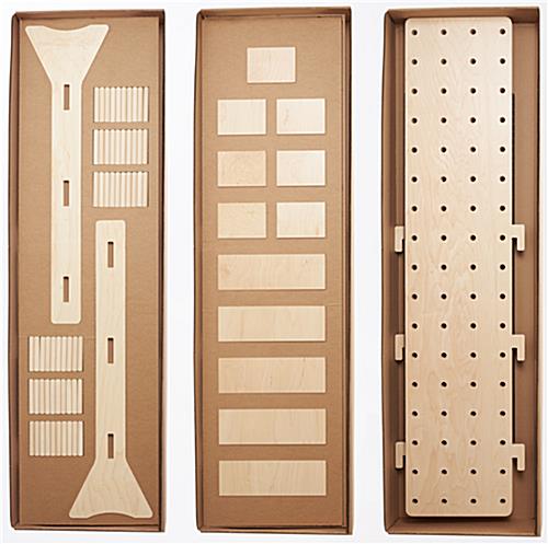 Folding pegboard display with flat ship packaging